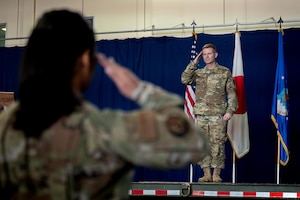 U.S. Air Force Col. John Conner, incoming 35th Mission Support Group (MSG) group commander, salutes to the MSG flight during a change of command ceremony.