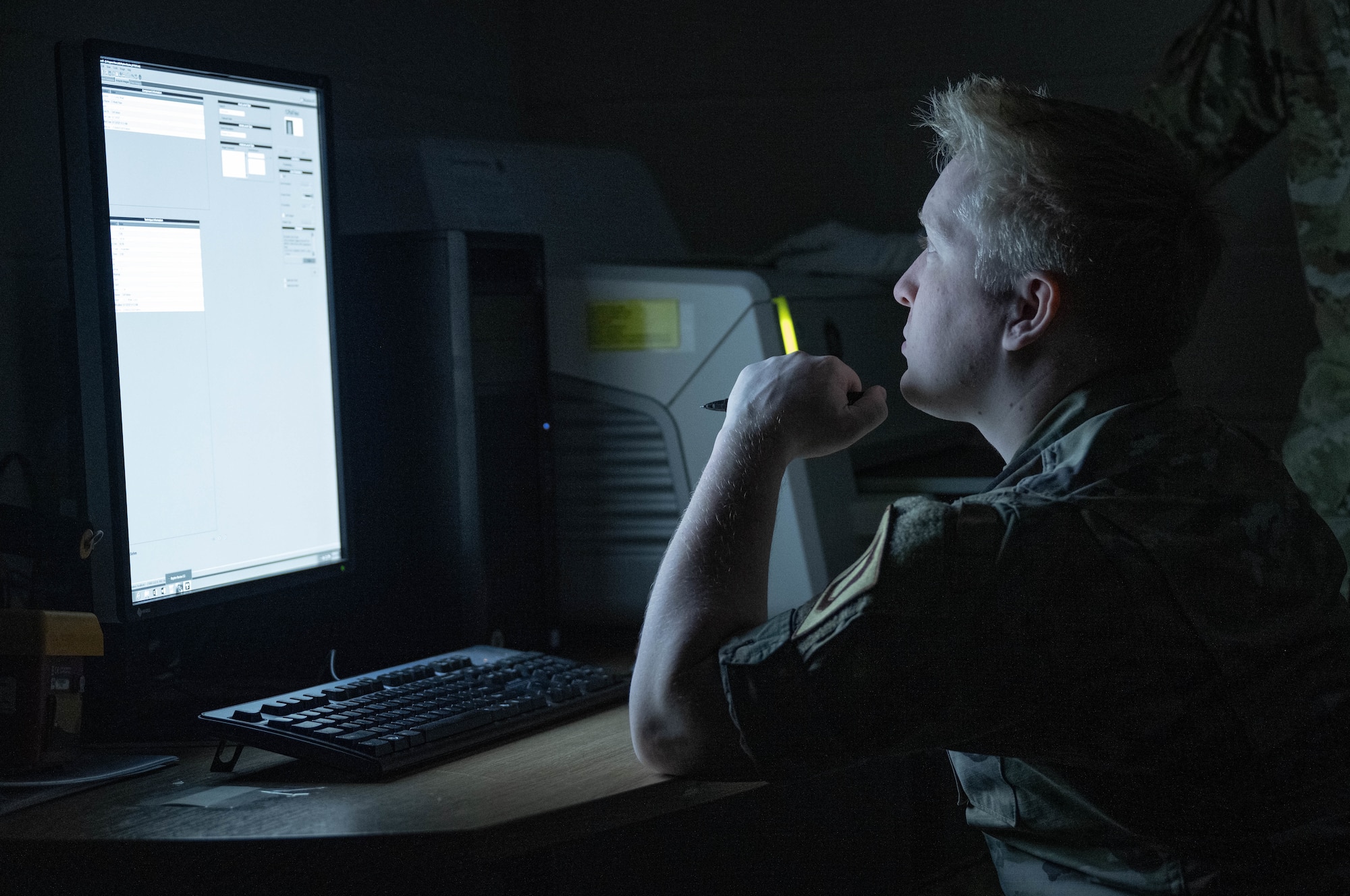 U.S. Air Force Senior Airman Colton Behm, 100th Maintenance Squadron non-destructive inspection journeymen, adjusts the photo settings of a digital printout during a Day in the Life immersion with the 100th MXS at RAF Mildenhall, England, June 13, 2025.