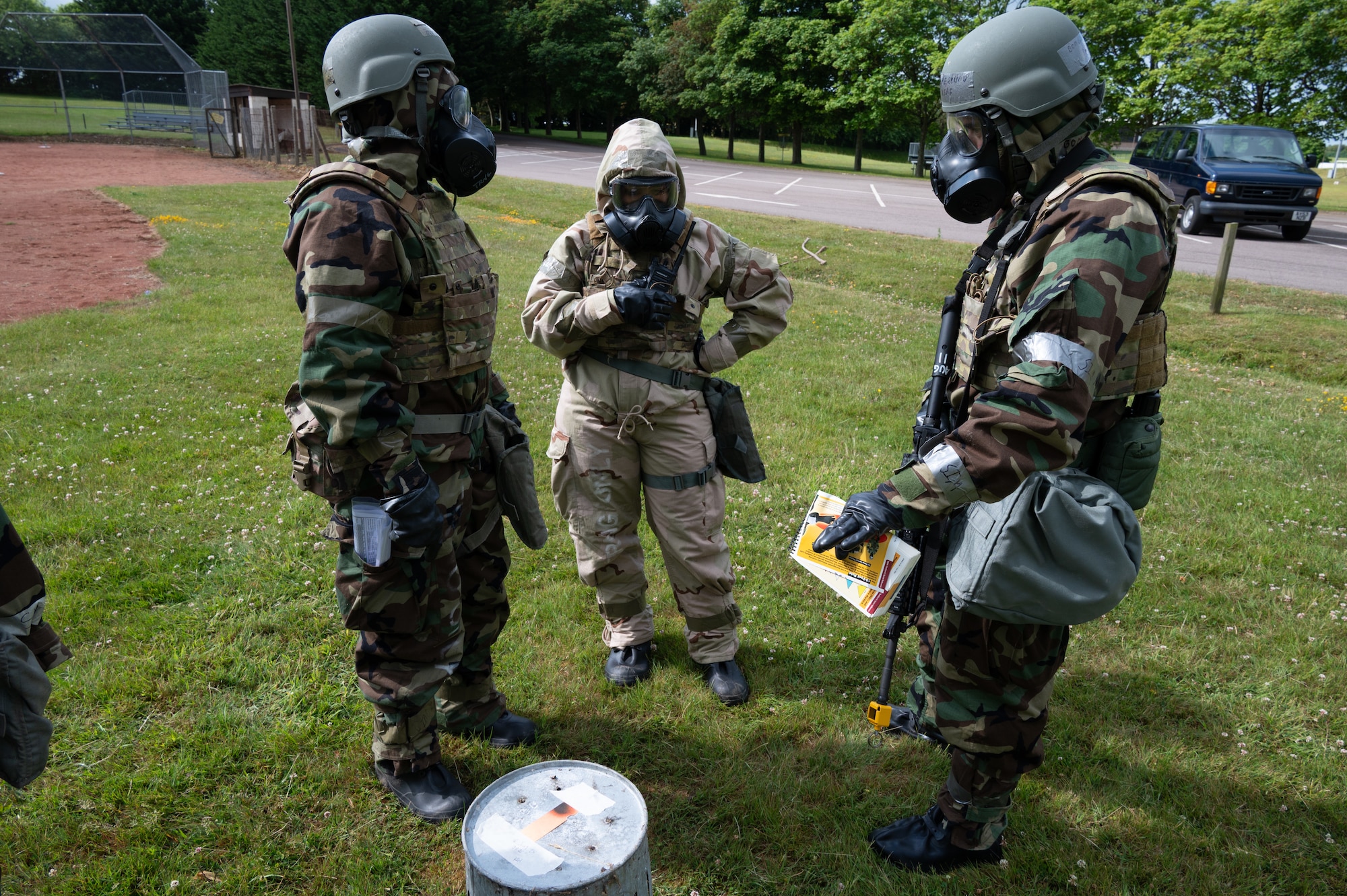 Members of the 501st Combat Support Wing examine Chemical, Biological, Radiological and Nuclear (CBRN) test strips
