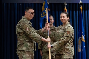 U.S. Air Force Maj. Elizabeth Pacyna, right, 39th Contracting Squadron incoming commander, assumes command during a change of command ceremony at Incirlik Air Base, Türkiye, June 16, 2025. The 39th CONS oversees more than $30 million in contract actions each year, supporting base operations, international agreements, and NATO missions across the region.