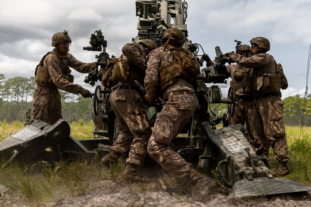 U.S. Marines with Golf Battery, Battalion Landing Team 3/6, 22nd Marine Expeditionary Unit (Special Operations Capable), operate an M777 Howitzer during a live-fire range on Camp Lejeune, North Carolina, June 4, 2025. Golf Battery conducted its live fire sustainment training to enhance tactical proficiency and maintain its high level of readiness in preparation of the 22nd MEU (SOC)’s upcoming deployment.  (U.S. Marine Corps photo by Lance Cpl. Kyle Baskin)