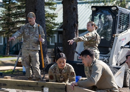 Airmen from the 141st Civil Engineer Squadron construct the base for a yurt at Seward Military Resort in Seward, Alaska, June 11, 2025.