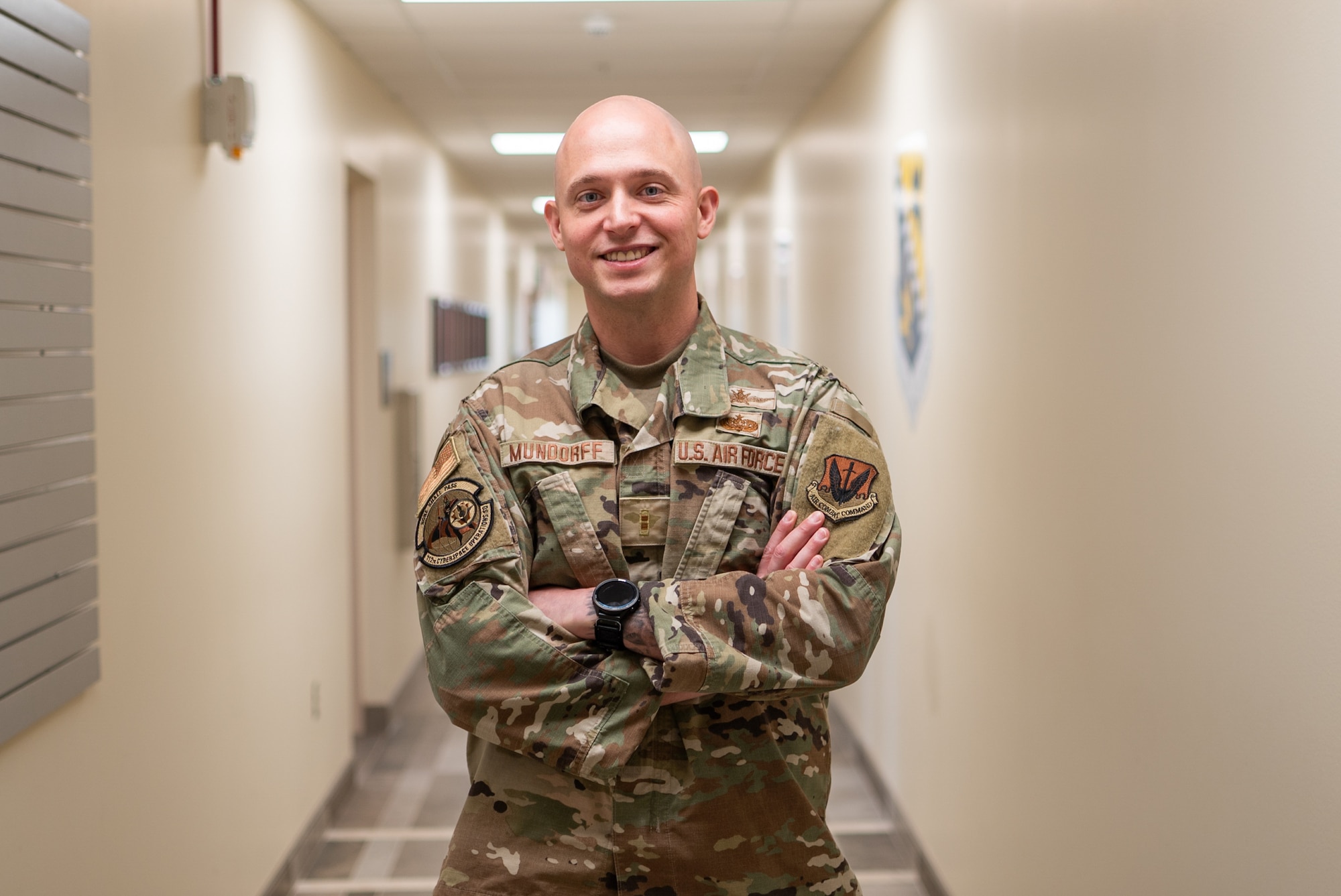 U.S. Air Force Chief Warrant Officer 2 Brian Mundorff, a 17Y Cyber Effects & Warfare Operations with the Pennsylvania Air National Guard, poses for a photo at Biddle Air National Guard Base, Pennsylvania, May 29, 2025.
