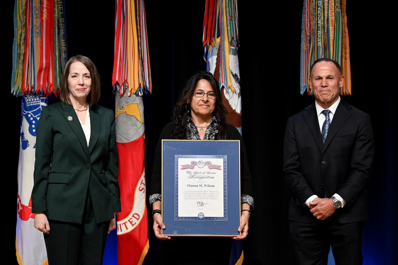 Jennifer C. Walsh, Performance Improvement Officer, Director, Administration and Management, presents a Spirit of Service Recognition award to Dianna M. Wilson during the Department of Defense Spirit of Service ceremony, a celebration of public service at the Pentagon, Arlington, Va., May 7, 2025.  (U.S. Army photo by Mr. Leroy Council)