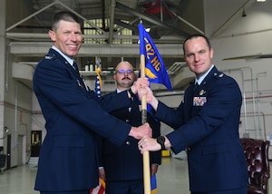 Lt. Col. Sean Abling accepts command of the 550th Helicopter Squadron during a ceremony June 12, 2025.