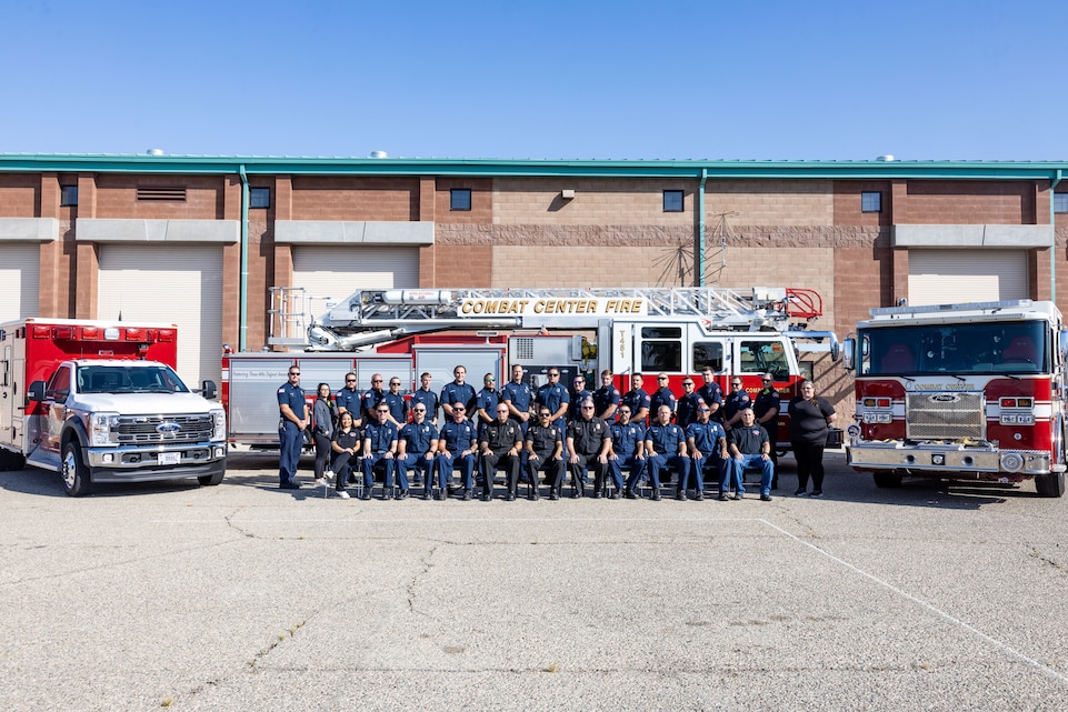 The Combat Center Fire department poses for a group photo at Marine Corps Air Ground Combat Center, Twentynine Palms, California, June 3, 2025. The CCFD was recognized as the 2024 United States Marine Corps Small Fire Department of the Year, honoring a year of exceptional performance, innovation, and community engagement at the Corps’ premier service-level training installation.  (U.S. Marine Corps photo by 1st Lt Kristian Floyd)