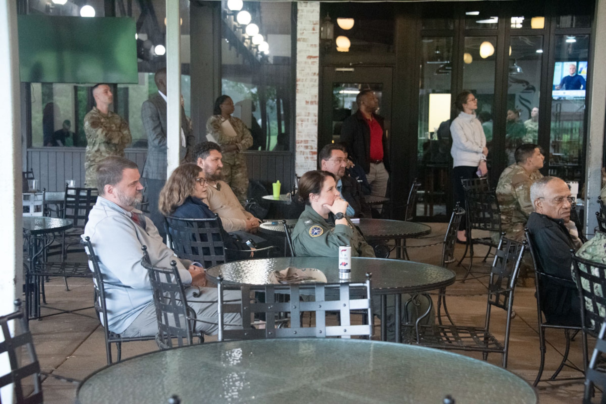 Community members listen to responses from base leadership during a town hall.