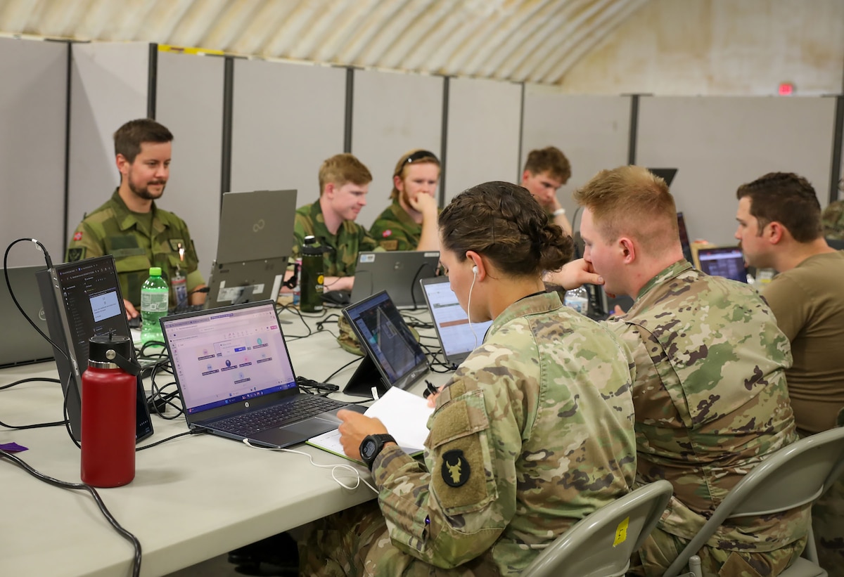 Minnesota National Guardsmen and Norway Officers work together during the annual Cyber Shield training event held at the Virginia National Guard’s State Military Reservation in Va. Beach, 30 May - 13 June, 2025.
