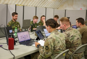 Minnesota National Guardsmen and Norway Officers work together during the annual Cyber Shield training event held at the Virginia National Guard’s State Military Reservation in Va. Beach, 30 May - 13 June, 2025.