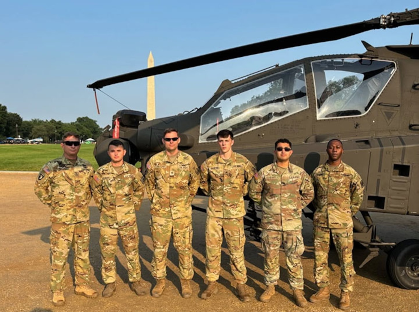 Crew members from the 1-130th Attack Battalion, North Carolina Army National Guard, support a static display during the U.S. Army's 250th birthday celebration on the National Mall in Washington, D.C., Saturday, June 14, 2025.