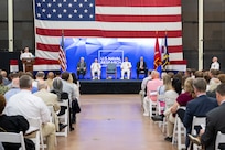 Outgoing Commanding Officer Capt. Jesse Black speaks during the U.S. Naval Research Laboratory (NRL) change of command ceremony, Washington, D.C., June 13, 2025. Joining him on stage are NRL’s Director of Research Dr. Bruce Danly, Chief of Naval Research Rear Adm. Kurt Rothenhaus, and incoming Commanding Officer Capt. Randy C Cruz. (U.S. Navy photo by Sarah Peterson)