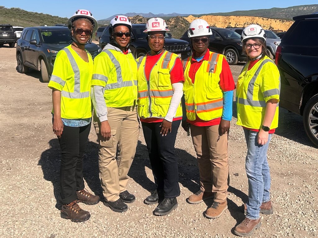 Melodie Fisher, a contract specialist with the U.S. Army Engineer Research and Development Center’s Contracting Office, poses with other U.S. Army Corps of Engineers (USACE) volunteers during her deployment to assist in the USACE wildfire recovery efforts in Los Angeles County.