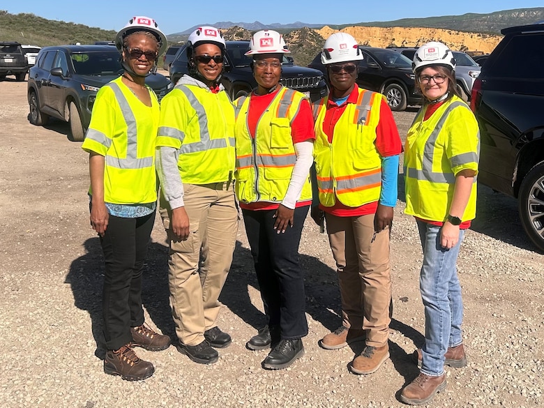 Melodie Fisher, a contract specialist with the U.S. Army Engineer Research and Development Center’s Contracting Office, poses with other U.S. Army Corps of Engineers (USACE) volunteers during her deployment to assist in the USACE wildfire recovery efforts in Los Angeles County.