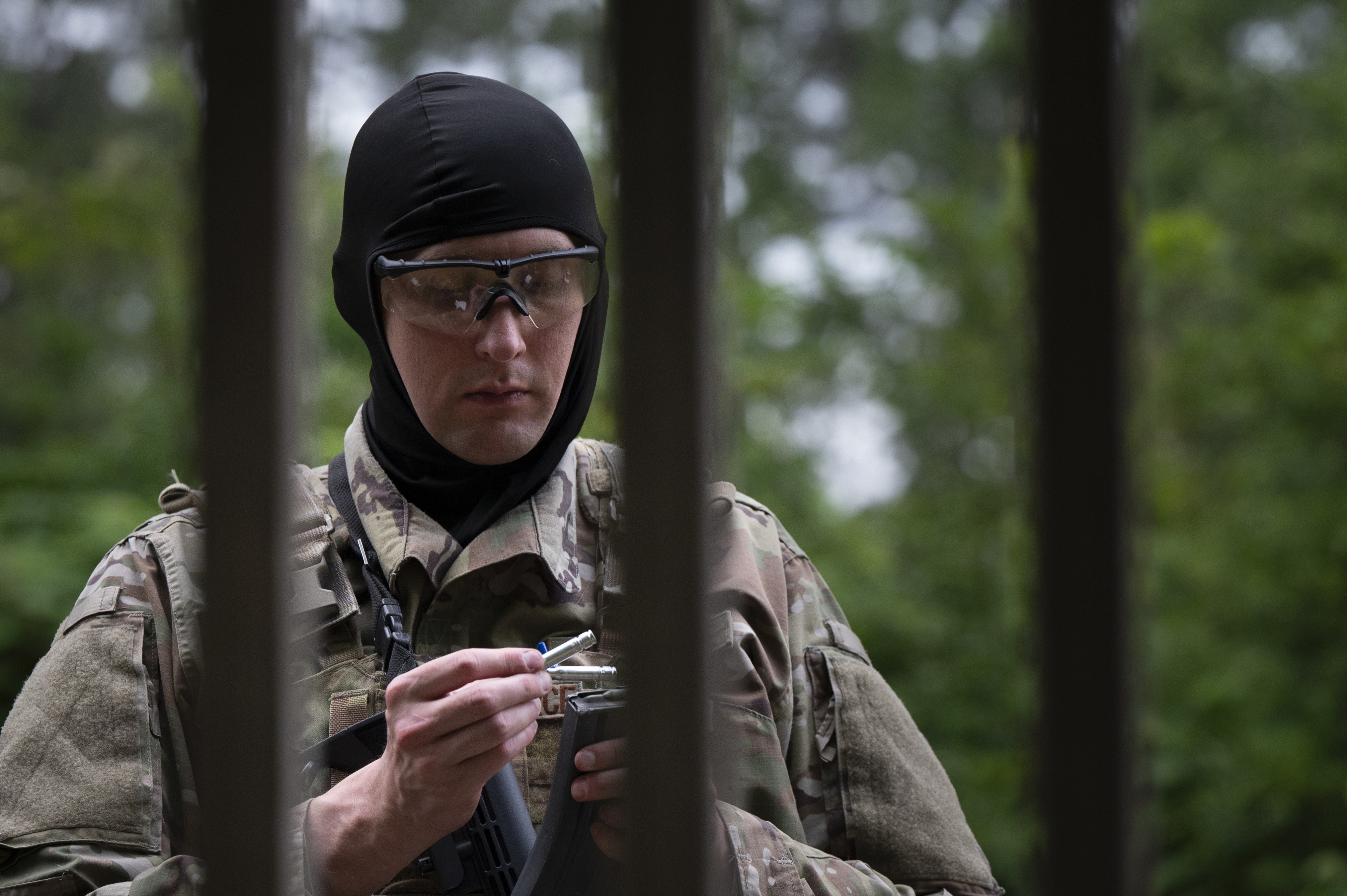 U.S. Air Force Staff Sgt. Stanly Goss, 94th Security Forces Squadron response force member, loads simulated munitions into a magazine at Dobbins Air Reserve Base, Ga., May 7, 2025. The 94th SFS conducted a 