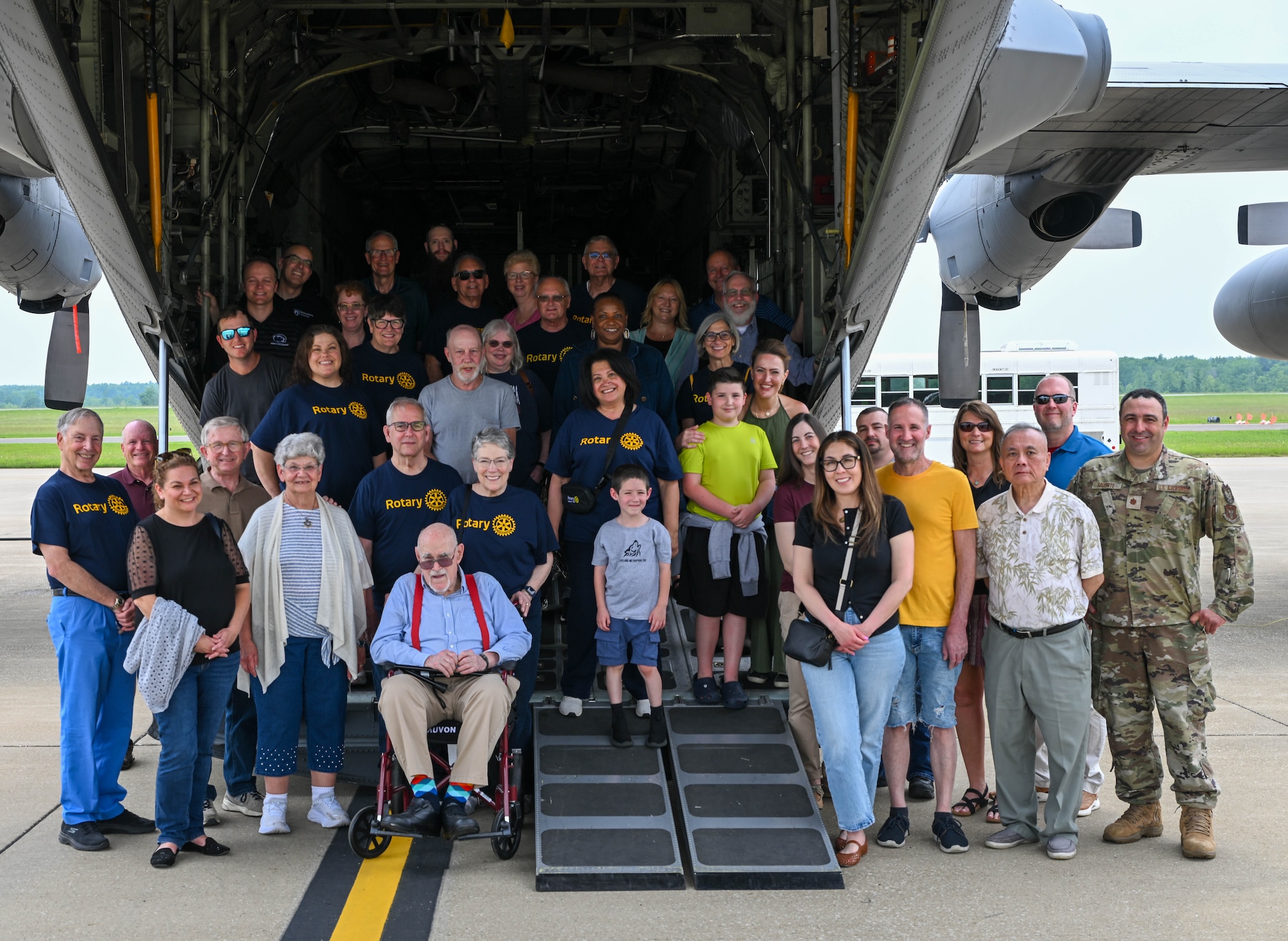 New Castle, Pennsylvania, Rotarians pose for a group photo at the back of a C-130H Hercules during a tour of Youngstown Air Reserve Station, Ohio, June 13, 2025.