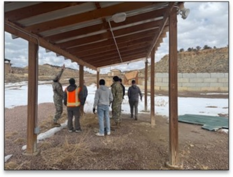 34th EST-A members inspect the Range 131C awnings to identify solutions to repair damaged roof sections and develop a cost-effective replacement.