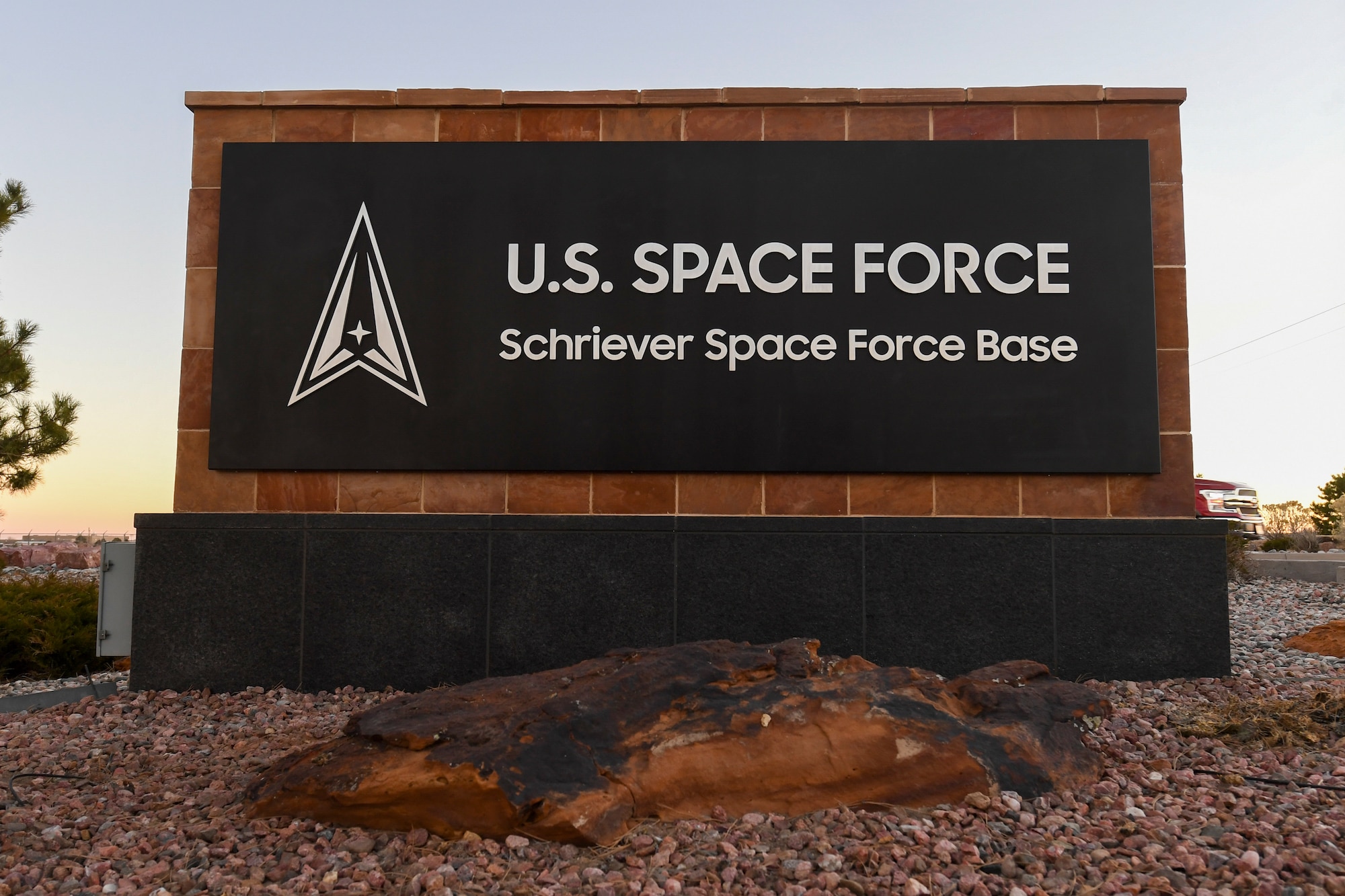 50th Civil Engineer Squadron manages the installation of the Schriever SFB sign at the main gate. (U.S. Space Force photo by Lekendrick Stallworth)