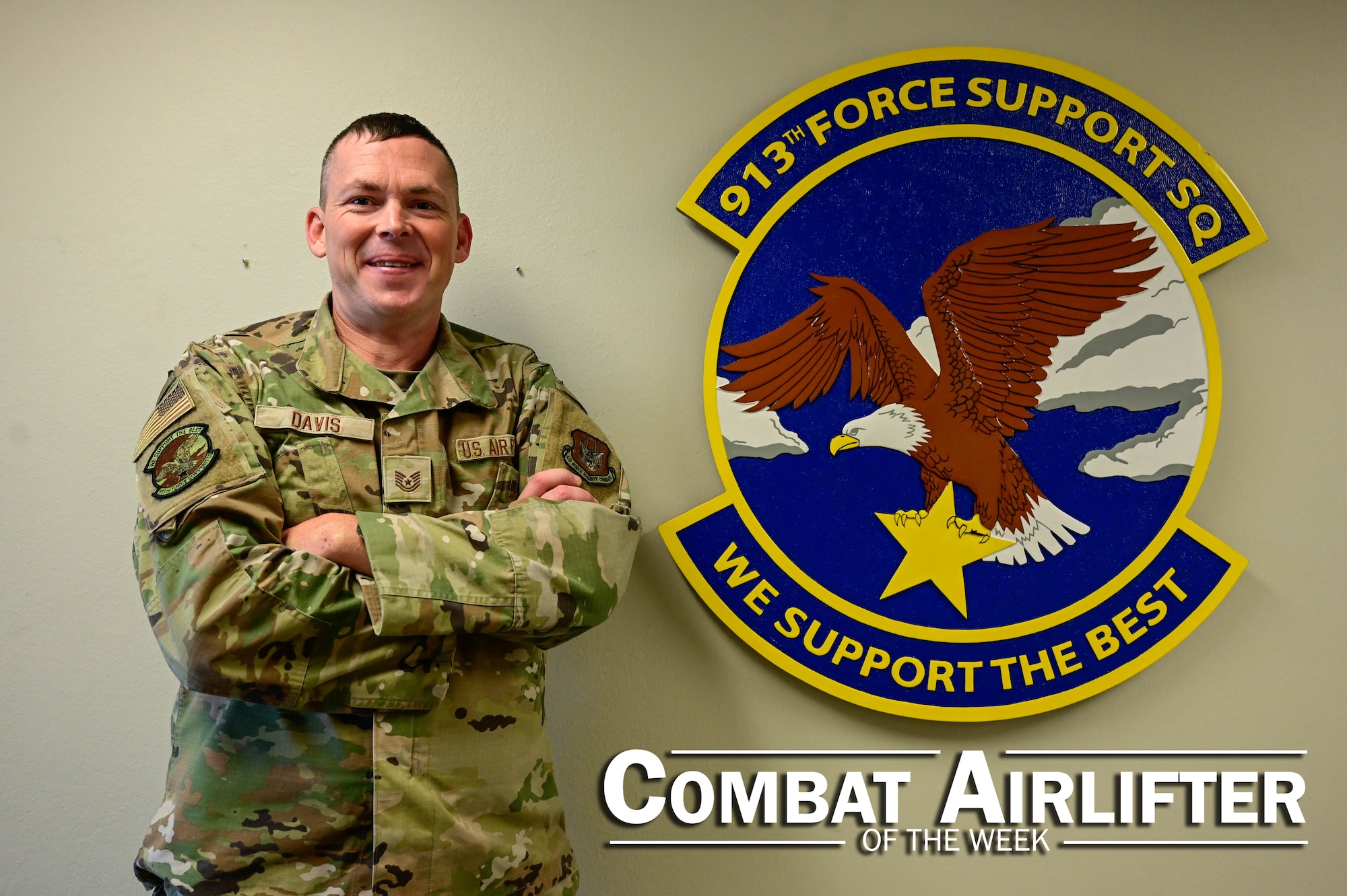A man in uniform poses for a photo.