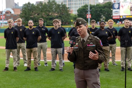 Col. Whitney Jensen, U.S. Army 3rd Recruiting Brigade commander, gives remarks in front of 18 Future Soldiers and baseball fans before an Indianapolis Indians baseball game at Victory Field in Indianapolis June 14, 2025. The Indians paid special tribute to the Army's 250th birthday. (U.S. Army photo by Mark R. W. Orders-Woempner)