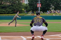 Col. Whitney Jensen, U.S. Army 3rd Recruiting Brigade commander, throws out a first pitch at an Indianapolis Indians baseball game at Victory Field in Indianapolis June 14, 2025. Eighteen Future Soldiers took the Oath of Enlistment before the game, which paid special tribute to the Army's 250th birthday. (U.S. Army photo by Mark R. W. Orders-Woempner)
