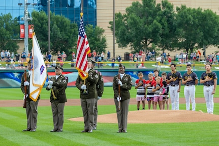 A color guard made up of recruiters from the U.S. Army Recruiting Battalion Indianapolis presents the Colors before an Indianapolis Indians baseball game at Victory Field in Indianapolis June 14, 2025. Eighteen Future Soldiers took the Oath of Enlistment before the game, which paid special tribute to the Army's 250th birthday. (U.S. Army photo by Mark R. W. Orders-Woempner)