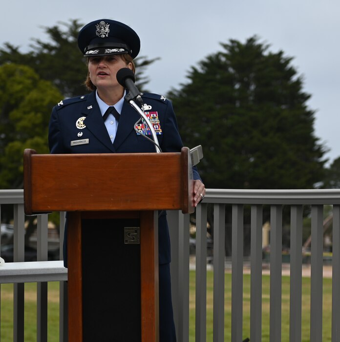 U.S. Air Force Col. Angelina Maguinness, 17th Training Wing commander, speaks to attendees during the 517th Training Group change of command ceremony on Soldier Field at the Presidio of Monterey, California, June 12, 2025. The 517th TRG is integrated with the Defense Language Institute Foreign Language Center and is responsible for training more than 3,600 students in more than 24 different foreign languages. (U.S. Air Force photo by Staff Sergeant Nathan Call)