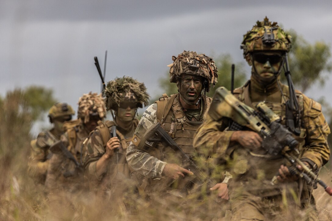 Soldiers from Battle Group Ram conduct air mobility operations supported by Battle Group Griffin during exercise Talisman Sabre 23 in Townsville Field Training Area, Queensland, Australia, July 26, 2023. Battle Group Ram consists of soldiers from Australia, United States, New Zealand, Fiji and France.