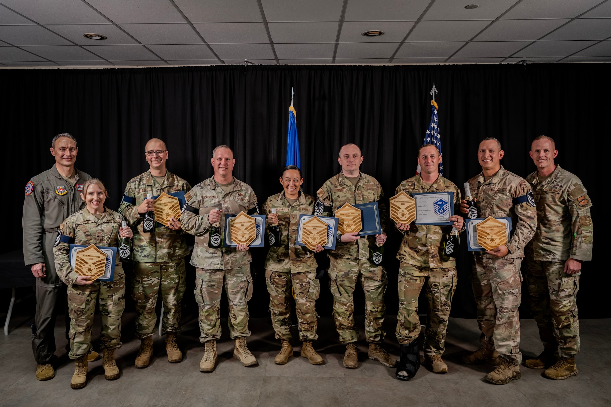 Team XL’s newest U.S. Air Force Master Sgt. selects pose for a group photo following their recognition ceremony at XL Landings, June 13, 2025. The Air Force selected 6,043 Airmen across the force for promotion to Master Sgt., including seven from the 47th Flying Training Wing. (U.S. Air Force photo by Airman 1st Class Darryl Keith)