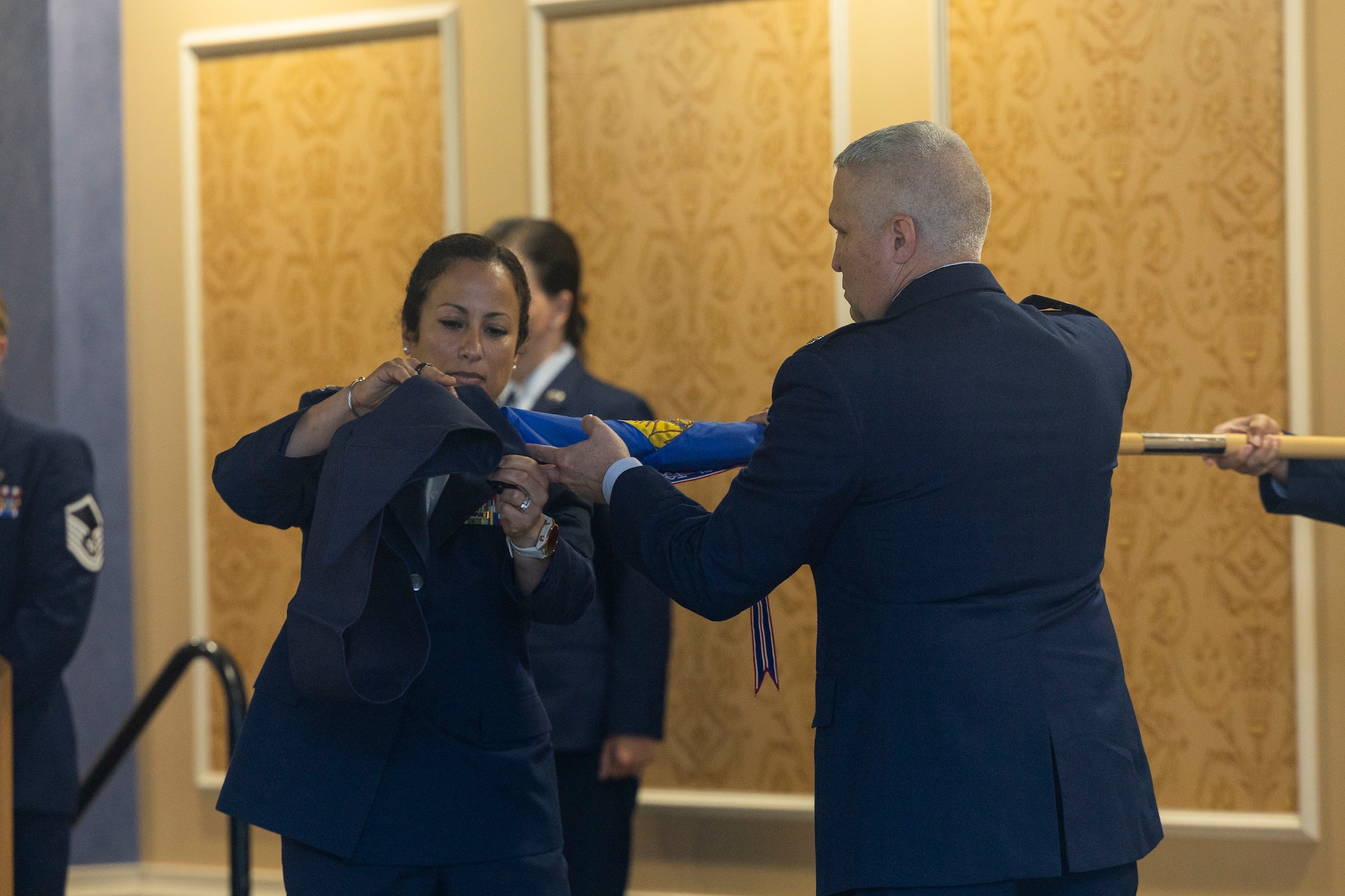Col. Manaal I. Burge, left, 192nd Mission Support Group commander, Virginia Air National Guard, and Lt. Col. Alex Shamp, 192nd Support Squadron commander, retire the 192nd SS guidon.