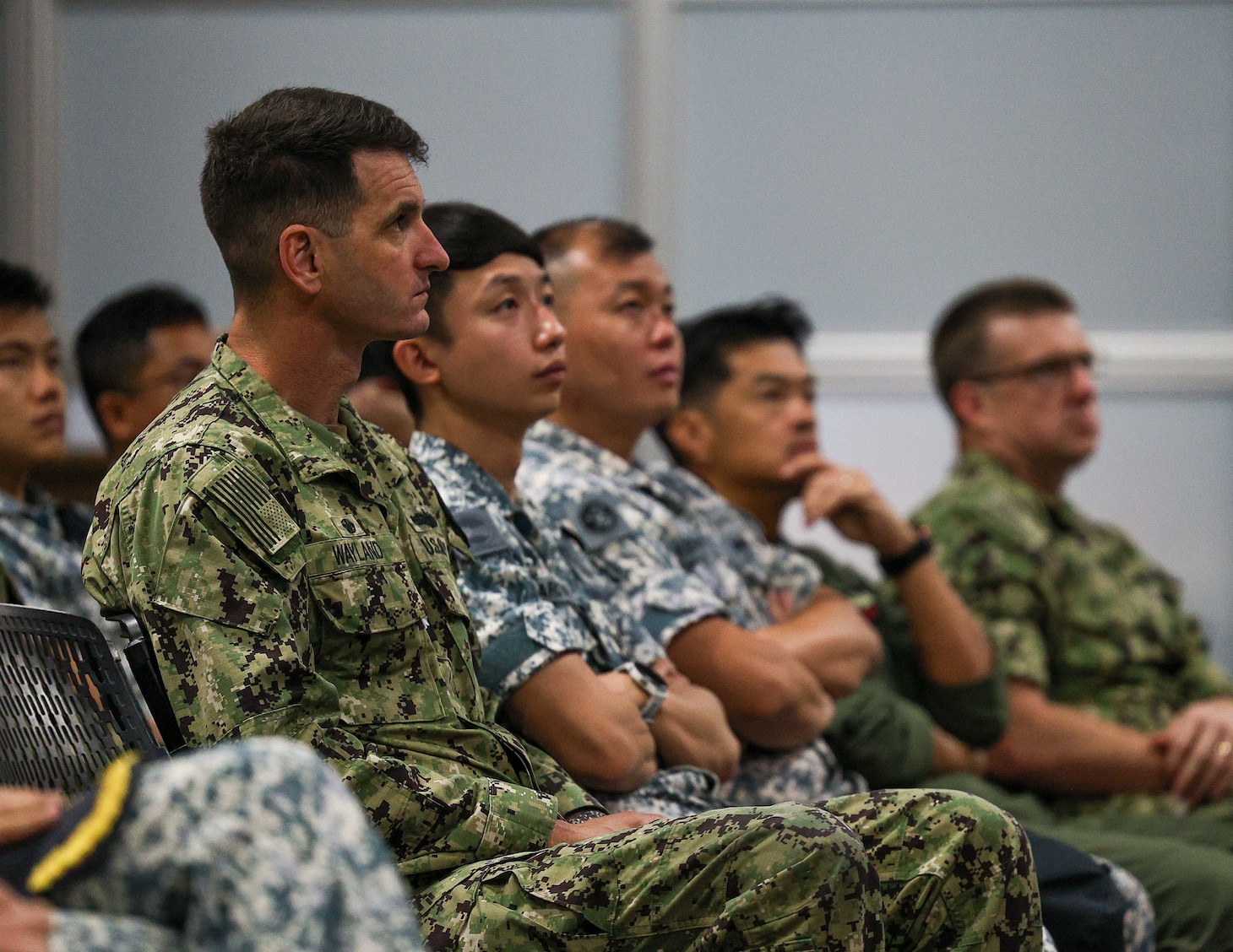 U.S. Naval Base, GUAM (June 6, 2025) – U.S. Navy Cmdr. Robert Wayland, commanding officer of Arleigh Burke-class guided-missile destroyer USS William P. Lawrence (DDG 110), left, and Republic of Singapore Navy Sailors with the Independence-class littoral mission vessel RSS Sovereignty (LMV 16) and Formidable-class stealth frigate RSS Supreme (FFG 73) attend a conference in preparation for Pacific Griffin 2025 while in port at U.S. Naval Base, Guam, June 6, 2025. Pacific Griffin 2025 is a biennial maritime exercise between the U.S. and Republic of Singapore, enhancing combined maritime proficiency while strengthening relationships during dynamic training evolutions ashore and at sea near Guam. (U.S. Navy photo by Mass Communication Specialist 3rd Class Petty Officer Gavin Arnoldhendershot)