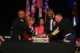 U.S. Army Pacific Commanding General Gen. Ronald P. Clark, retired USARPAC Commander Gen. Vincent K. Brooks, Command Sgt. Maj. Jason Schmidt, and distinguished guests join in cutting the Army’s 250th Birthday Cake during a commemorative ceremony held June 14, 2025.