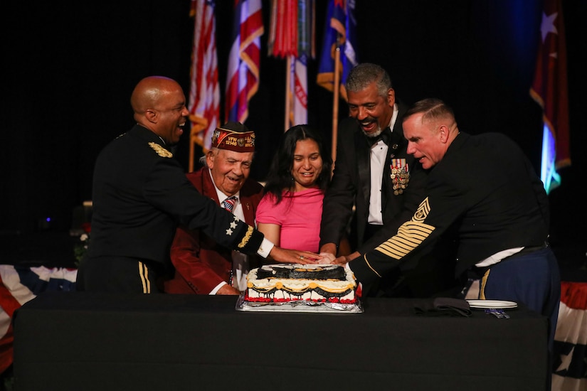 U.S. Army Pacific Commanding General Gen. Ronald P. Clark, retired USARPAC Commander Gen. Vincent K. Brooks, Command Sgt. Maj. Jason Schmidt, and distinguished guests join in cutting the Army’s 250th Birthday Cake during a commemorative ceremony held June 14, 2025.