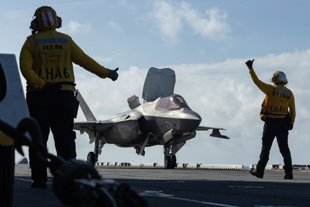 A U.S. Marine Corps F-35B Lightning II aircraft assigned to Marine Fighter Attack Squadron (VMFA) 242, 31st Marine Expeditionary Unit, prepares to take-off during flight operations aboard the amphibious assault ship USS America (LHA 6), in the Coral Sea, June 10, 2025. Marine F-35Bs bring a 5th generation multi-discipline strike capability to support combined-joint all domain operations in key maritime terrain. The 31st MEU is operating aboard ships of the USS America Amphibious Ready Group in the 7th Fleet area of operations, the U.S. Navy’s largest forward deployed numbered fleet, and routinely interacts and operates with allies and partners in preserving a free and open Indo-Pacific region. (U.S. Marine Corps photo by Lance Cpl. Gerardo Mendez)