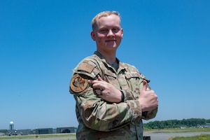 Wild Weasel of the Week, U.S. Air Force Airman Quintin Humbert, 35th Operations Support Squadron radar, airfield and weather systems technician, stands on the flightline at Misawa Air Base, Japan.