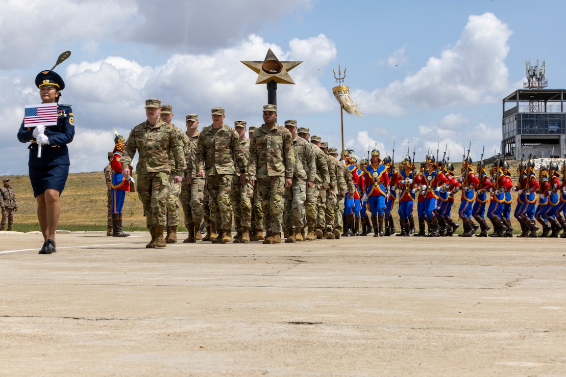 U.S. Army Soldiers assigned to 11th Military Police Brigade, 200th Military Police Command, march during the opening ceramony for Khaan Quest 2025, on June 14, 2025, at Five Hills Training Area, Mongolia.