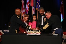 U.S. Army Pacific Commanding General Gen. Ronald P. Clark, retired USARPAC Commander Gen. Vincent K. Brooks, Command Sgt. Maj. Jason Schmidt, and distinguished guests join in cutting the Army’s 250th Birthday Cake during a commemorative ceremony held June 14, 2025.
