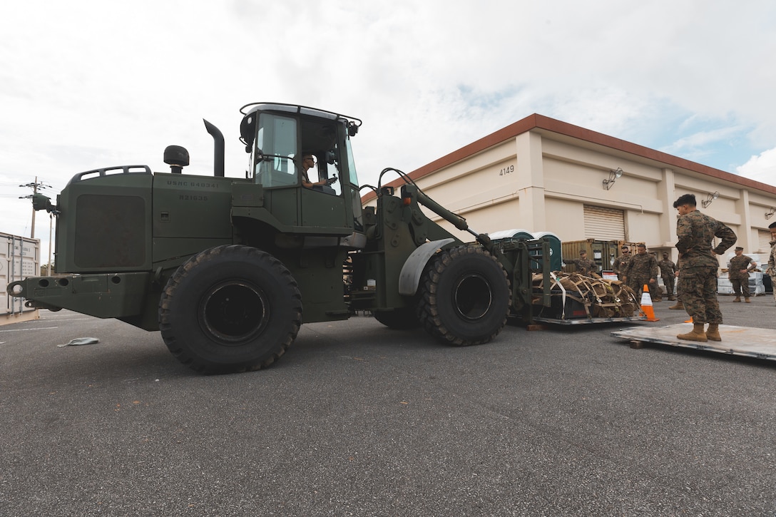 U.S. Marines with III Marine Expeditionary Force, weigh cargo to support accurate load planning and accountability for strategic airlift operations during an Alert Contingency Marine Air-Ground Task Force (ACM) and Strategic Mobility Operations Exercise at Camp Courtney, Okinawa, Japan, May 19, 2025. The exercise tested III MEF’s ability to rapidly generate, deploy, and sustain combat-ready forces through alert contingency response, strategic mobility execution, and integrated command and control operations. (U.S. Marine Corps photo by Cpl. Diego Garcia)