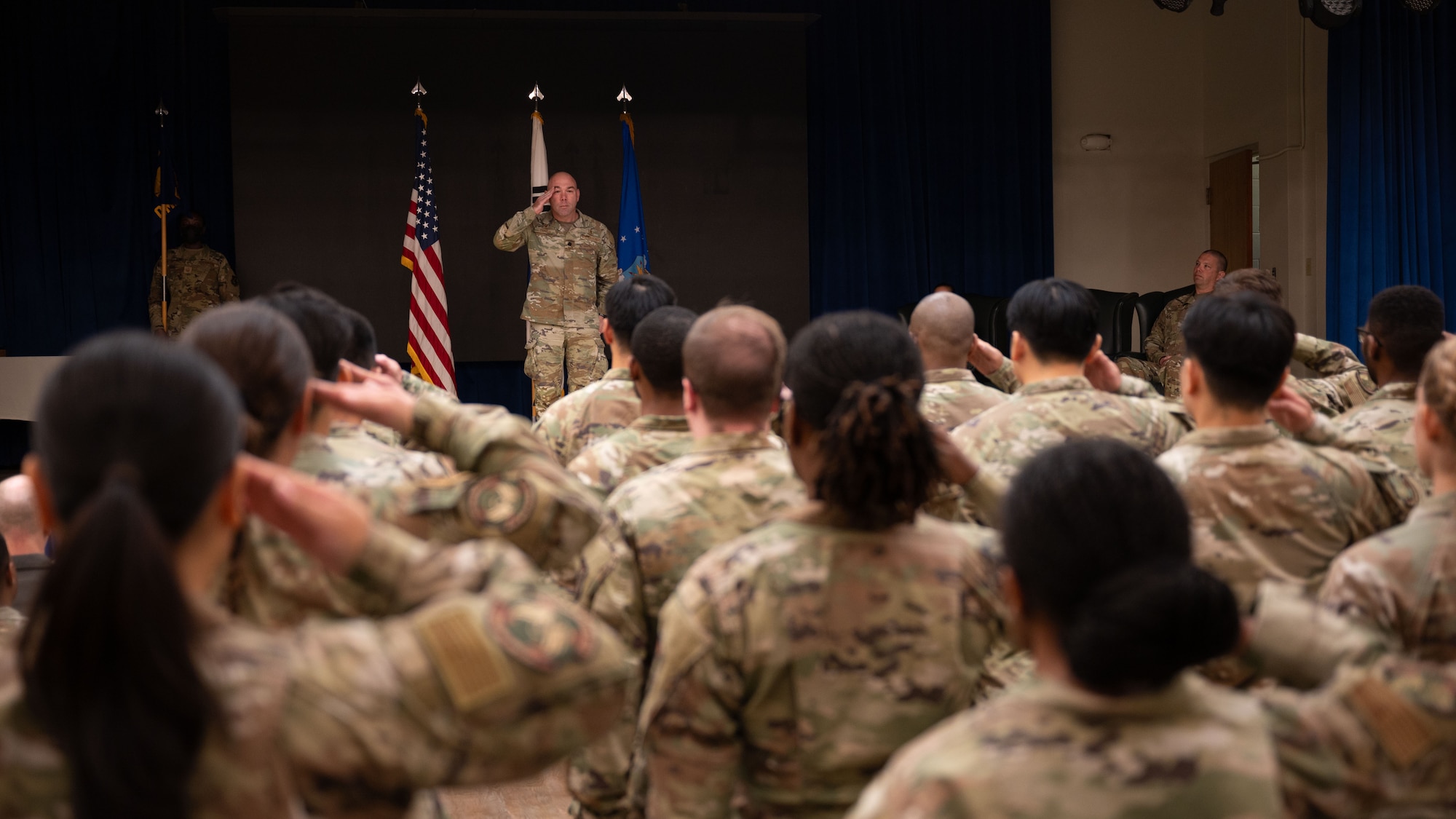 U.S. Air Force Lt. Col Darrick Duran, incoming 51st Operational Medical Readiness Squadron commander, renders his first salute during a Change of Command ceremony at Osan Air Base, Republic of Korea, June 17, 2025. Previously, Duran served as the Deputy Commander, 347th Mission Support Group, Yokota AFB, Japan, where he led 2,800 military and civilian personnel across six squadrons and one geographically separated flight and managed over $7 billion in assets. (U.S. Air Force photo by Senior Airman Rome Bowermaster)