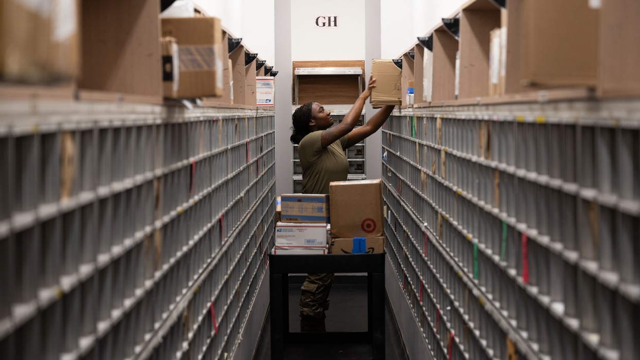 U.S. Air Force Airman 1st Class Naviyah Taylor, 51st Force Support Squadron military postal clerk, stores packages for customer pickup at Osan Air Base, Republic of Korea, June 16, 2025. The post office receives packages for service members, dependents and civilians assigned to the base. (U.S. Air Force photo by Senior Airman Rome Bowermaster)