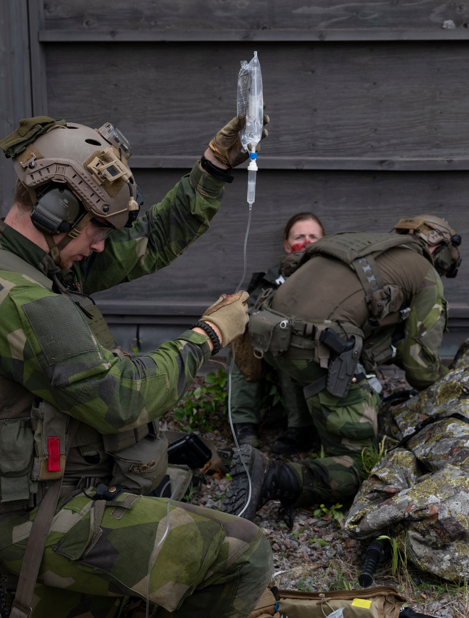 combat medics treating simulated injuries