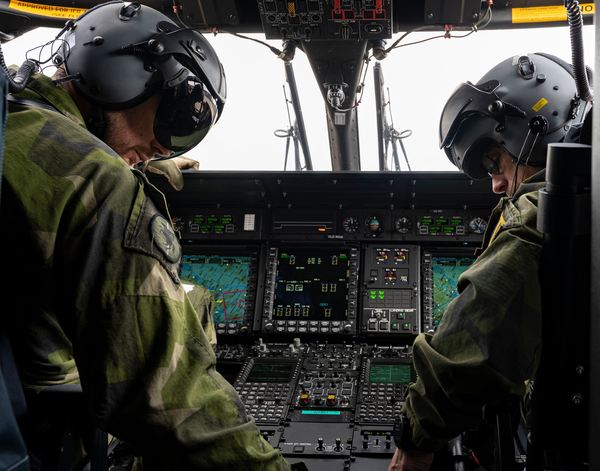 pilots in helicopter