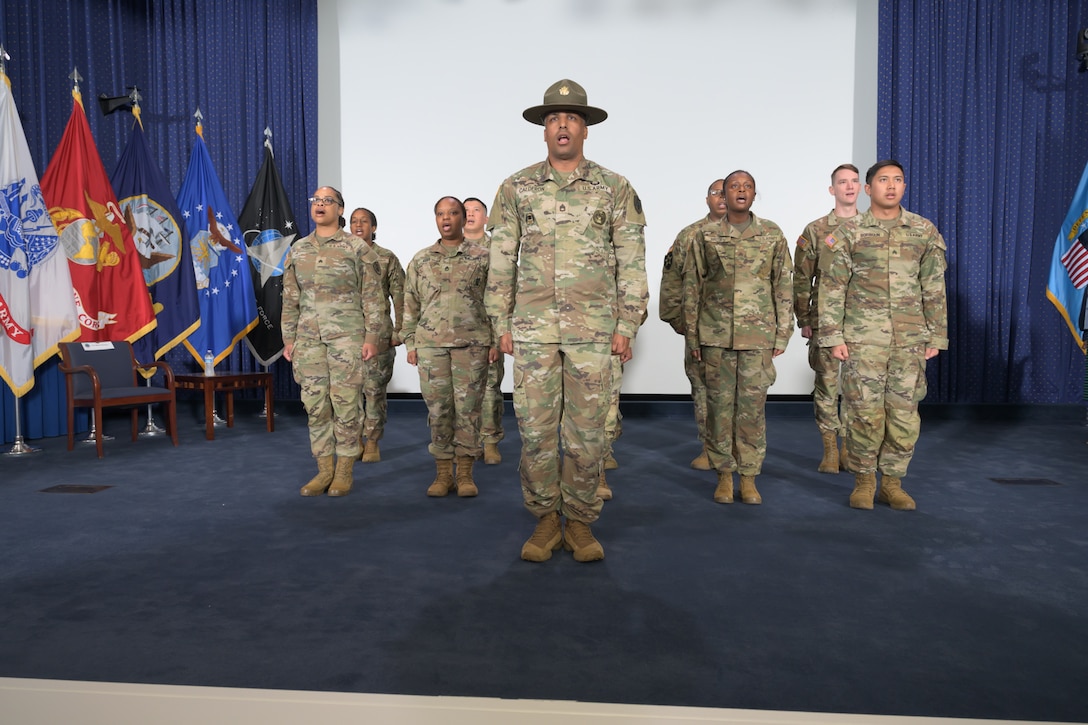The Defense Logistics Agency Director’s Executive Chauffeur Army Sgt. 1st Class Kevin Calderon leads soldiers in formation to sing cadence and recite the Army Creed during DLA’s 250th Army birthday ceremony at the McNamara Headquarters Complex Auditorium, Fort Belvoir, Virginia, June 13, 2025.