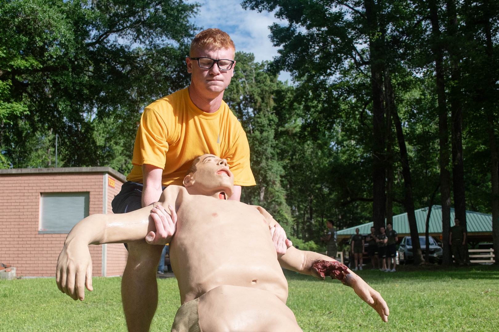 *Training* Hospital Corpsman Nicholas Regis, a Sailor assigned to Naval Health Clinic Cherry Point, drags a training manikin during the Corpsman Cup held Friday, June 13 aboard Marine Corps Air Station Cherry Point.  The event tested the Corpsmen’s’ tactical medical skills, mental resilience and physical fitness through various stations.