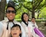 Man and family pose for a photo