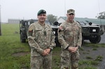 Lithuanian Command Sgt. Maj. Ruslanas Gulevas, senior enlisted leader of the Grand Duke Algirdas Infantry Battalion, Lithuanian Land Forces, left, and U.S. Army Command Sgt. Maj. Jason L. Barclay, senior enlisted advisor for 1st Battalion, 111th Infantry Regiment, 56th Stryker Brigade Combat Team, Pennsylvania Army National Guard, tour Fort Indiantown Gap as part of a bilateral engagement through the State Partnership Program, June 15, 2025. The two leaders, who served together during a joint mission in Afghanistan in 2011, reunited during a training event.