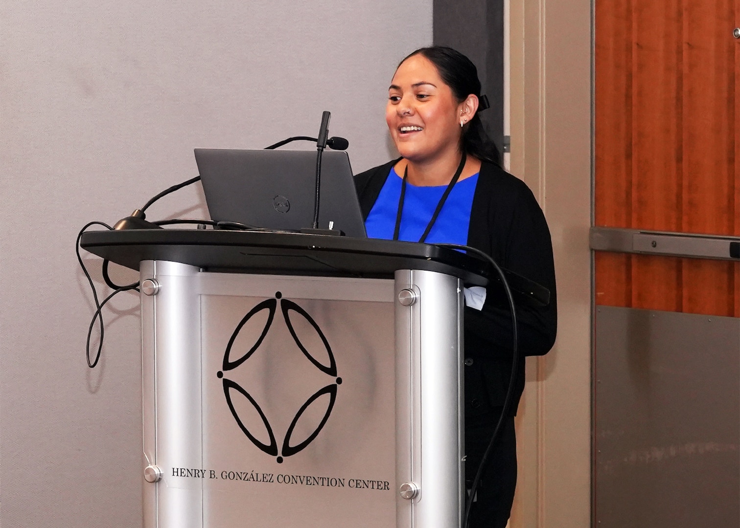 SAN ANTONIO – (June 16, 2025) – Phylisia Dimas, a research associate assigned to Naval Medical Research Unit (NAMRU) San Antonio’s Combat Casualty Care and Operational Medicine directorate, presented research on the “Protection of the Injured Endothelium by FDA-Approved and Experimental Drugs in In Vitro Models” at the San Antonio Military Health and Universities Research Forum Podium Session on Trauma – Preclinical Studies during the annual AIM Health R&D Summit held at the Henry B. Gonzalez Convention Center. Designed to promote cross-sector collaboration in the development of life-saving battlefield technologies, the one-day summit brings together top innovators from academia, industry, and the military to accelerate the research, development, and commercialization of transformative medical technologies. Collaborating and working alongside a wide range of research and development partners keeps Navy Medicine Research & Development (NMR&D) abreast of best practices and advances in medical knowledge. NAMRU San Antonio, part of NMR&D conducts gap-driven combat casualty care, craniofacial, and directed energy research in support of Navy, Marine Corps and joint U.S. warfighter health readiness and lethality while engaged in routine and expeditionary operations. (U.S. Navy photo by Burrell Parmer, NAMRU San Antonio Public Affairs/Released)