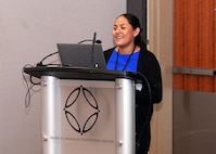 SAN ANTONIO – (June 16, 2025) – Phylisia Dimas, a research associate assigned to Naval Medical Research Unit (NAMRU) San Antonio’s Combat Casualty Care and Operational Medicine directorate, presented research on the “Protection of the Injured Endothelium by FDA-Approved and Experimental Drugs in In Vitro Models” at the San Antonio Military Health and Universities Research Forum Podium Session on Trauma – Preclinical Studies during the annual AIM Health R&D Summit held at the Henry B. Gonzalez Convention Center. Designed to promote cross-sector collaboration in the development of life-saving battlefield technologies, the one-day summit brings together top innovators from academia, industry, and the military to accelerate the research, development, and commercialization of transformative medical technologies. Collaborating and working alongside a wide range of research and development partners keeps Navy Medicine Research & Development (NMR&D) abreast of best practices and advances in medical knowledge. NAMRU San Antonio, part of NMR&D conducts gap-driven combat casualty care, craniofacial, and directed energy research in support of Navy, Marine Corps and joint U.S. warfighter health readiness and lethality while engaged in routine and expeditionary operations. (U.S. Navy photo by Burrell Parmer, NAMRU San Antonio Public Affairs/Released)