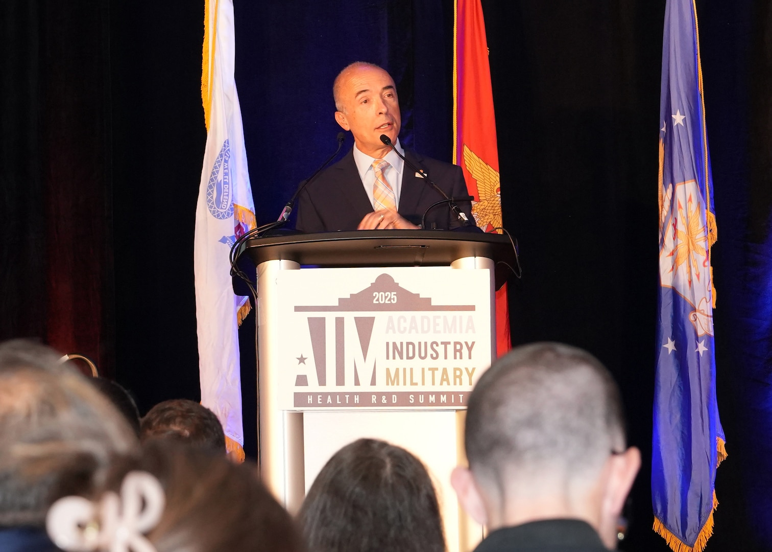 SAN ANTONIO – (June 16, 2025) – Retired U.S. Air Force Lt. Gen. Robert Miller, associate vice president and director of the Military Health Institute at the University of Texas Health Science Center San Antonio was the keynote speaker at the annual AIM Health R&D Summit held at the Henry B. Gonzalez Convention Center. Designed to promote cross-sector collaboration in the development of life-saving battlefield technologies, the one-day summit brings together top innovators from academia, industry, and the military to accelerate the research, development, and commercialization of transformative medical technologies. Collaborating and working alongside a wide range of research and development partners keeps Navy Medicine Research & Development (NMR&D) abreast of best practices and advances in medical knowledge. NAMRU San Antonio, part of NMR&D conducts gap-driven combat casualty care, craniofacial, and directed energy research in support of Navy, Marine Corps and joint U.S. warfighter health readiness and lethality while engaged in routine and expeditionary operations. (U.S. Navy photo by Burrell Parmer, NAMRU San Antonio Public Affairs/Released)