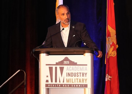SAN ANTONIO – (June 16, 2025) – Rene Dominguez, president and CEO of VelocityTX welcomes military, academic, and industry partners and guest to the annual AIM Health R&D Summit held at the Henry B. Gonzalez Convention Center. Designed to promote cross-sector collaboration in the development of life-saving battlefield technologies, the one-day summit brings together top innovators from academia, industry, and the military to accelerate the research, development, and commercialization of transformative medical technologies. Collaborating and working alongside a wide range of research and development partners keeps Navy Medicine Research & Development (NMR&D) abreast of best practices and advances in medical knowledge. NAMRU San Antonio, part of NMR&D conducts gap-driven combat casualty care, craniofacial, and directed energy research in support of Navy, Marine Corps and joint U.S. warfighter health readiness and lethality while engaged in routine and expeditionary operations. (U.S. Navy photo by Burrell Parmer, NAMRU San Antonio Public Affairs/Released)