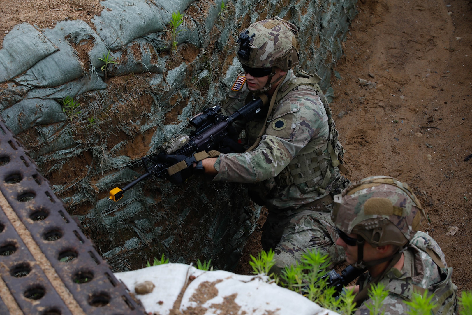 U.S. Army Soldiers assigned to Charlie Company, 1st Battalion, 125th Infantry Regiment, Michigan Army National Guard, maneuver through the trenches during Exercise Baltic Viking near Alūksne, Latvia, June 8, 2025.